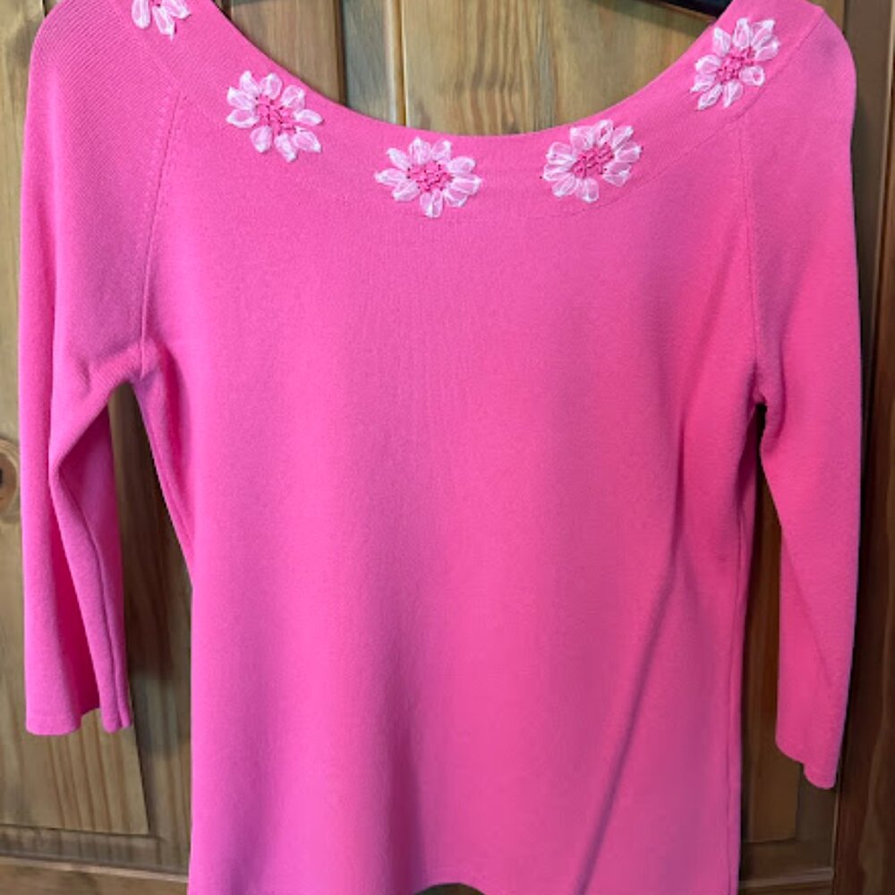 Top (pink with light white flowers)